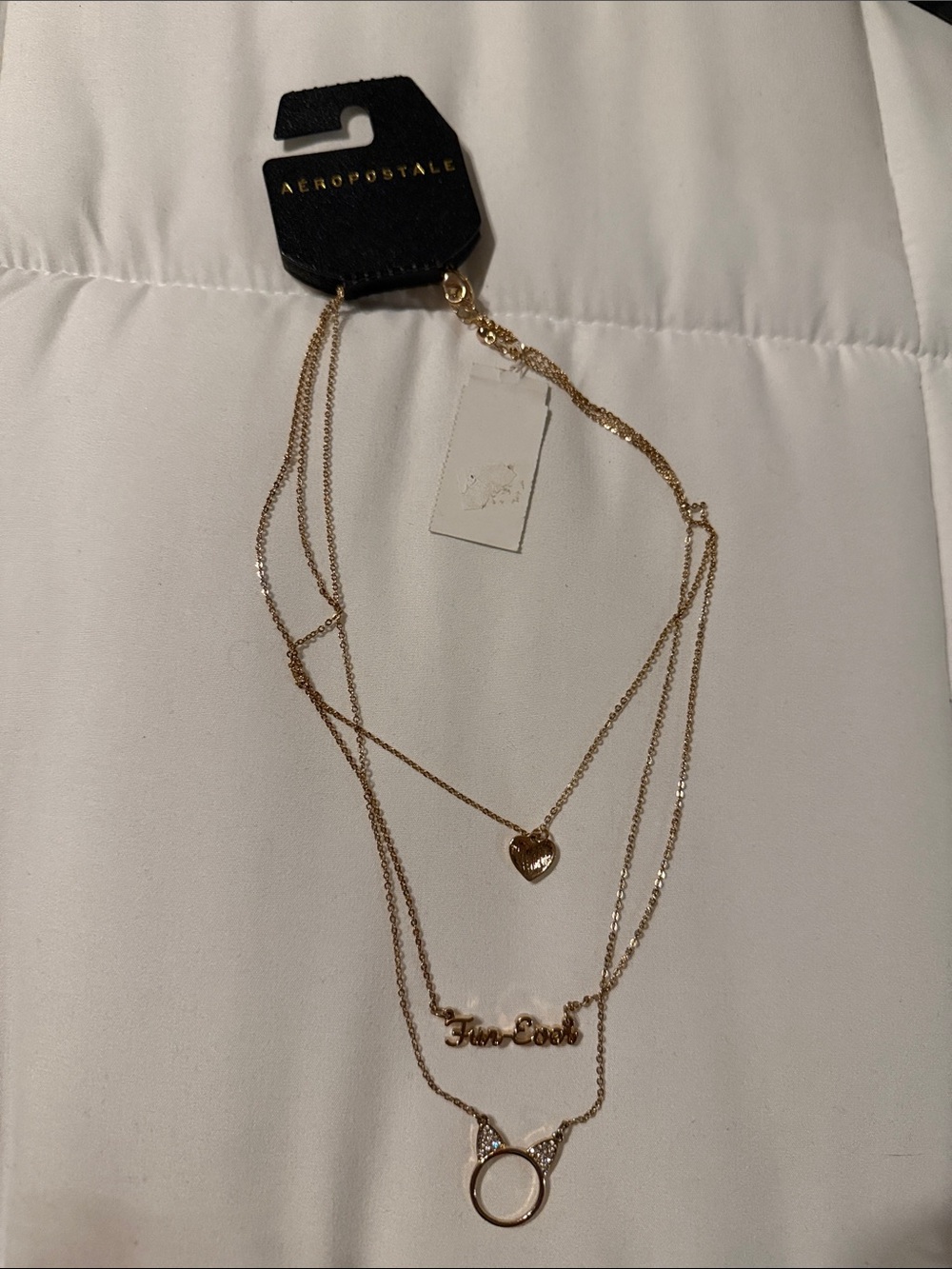 Aeropostale Gold Layered Necklace Trio with Heart, Nameplate & Cat Ring